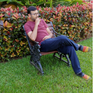Nitin Shah, sitting in a garden